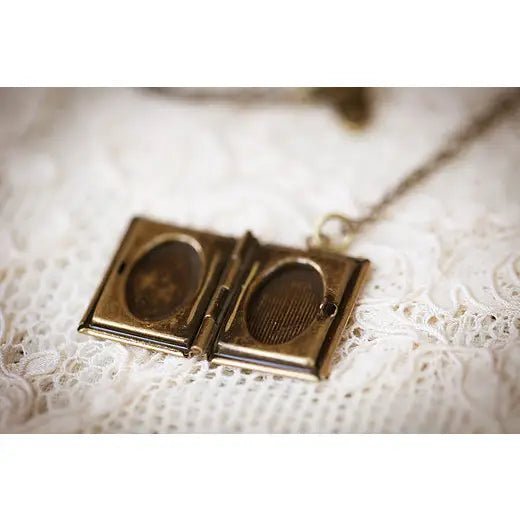 On the Seventh Day of Christmas, Leonard Gives... Book Locket Necklace: A Story Waiting to Be Told - Myth & Ink: Worlds of C.A. Smith
