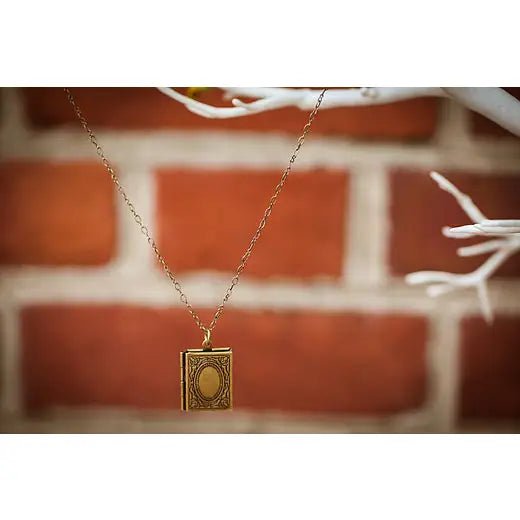 On the Seventh Day of Christmas, Leonard Gives... Book Locket Necklace: A Story Waiting to Be Told - Myth & Ink: Worlds of C.A. Smith
